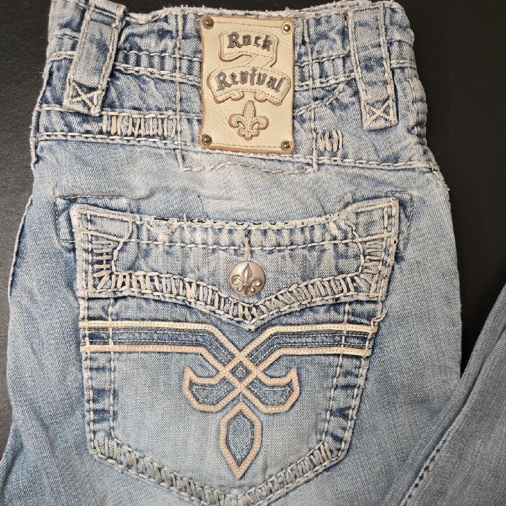 Rock Revival Boot Cut Ripped Jeans in Light Blue